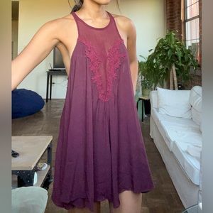 Burgundy romper with sheer v-neck